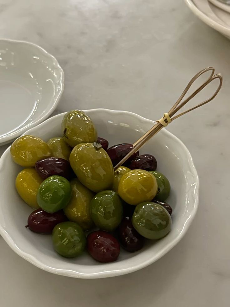 Woman works on the presentation slides on their laptop.